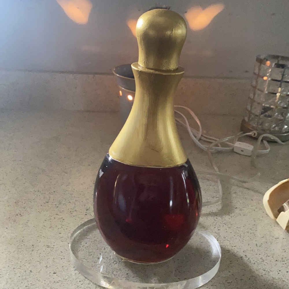 Halston XL vintage perfume bottle full of original perfume smells great